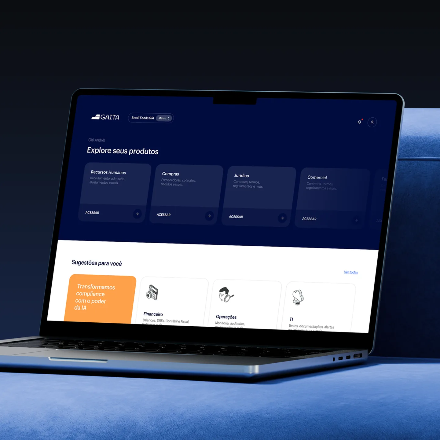 GAITA corporate platform dashboard on a laptop